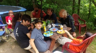 Eating together after some house construction in Marshall, N.C.